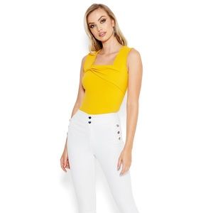 BEBE BUTTON DETAIL SKINNY DENIM